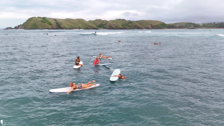 Enjoy surfboard in Kuta Lombok beach Surfwell
