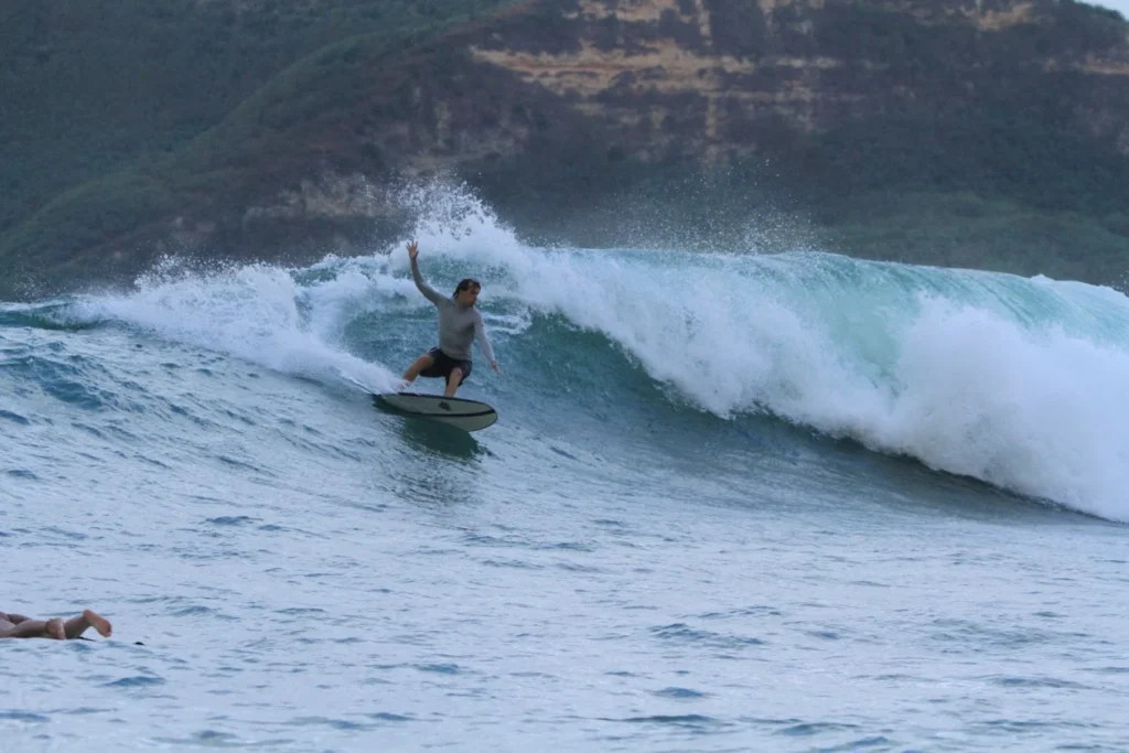 Clean right-hand waves rolling through Gerupuk Bay during Lombok’s dry season