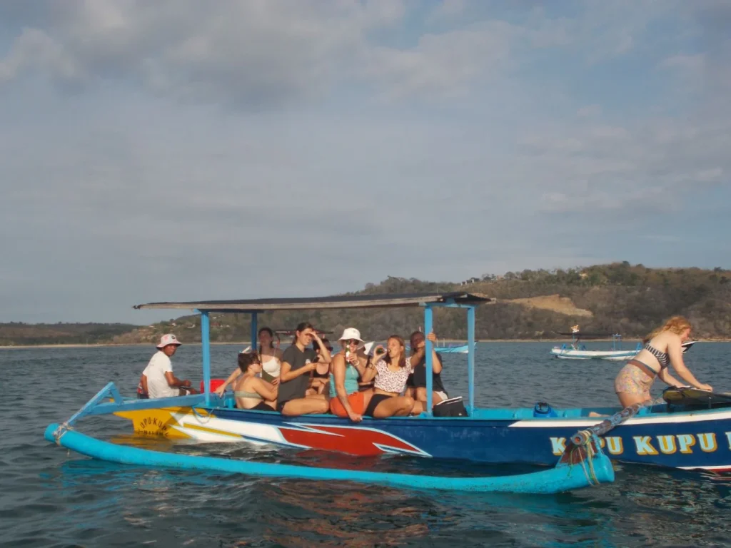 Local surf boat taking surfers to Gerupuk Bay surf breaks in South Lombok