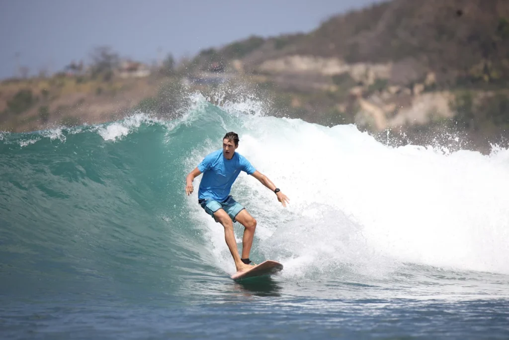 Gerupuk Beach Lombok intermediate surf spot with local boats and rolling waves