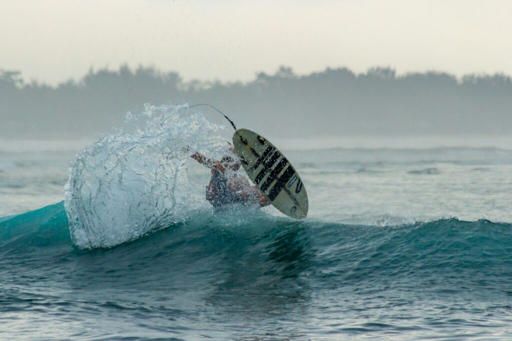 Surfing at Gili Islands – Catching waves in crystal-clear turquoise waters